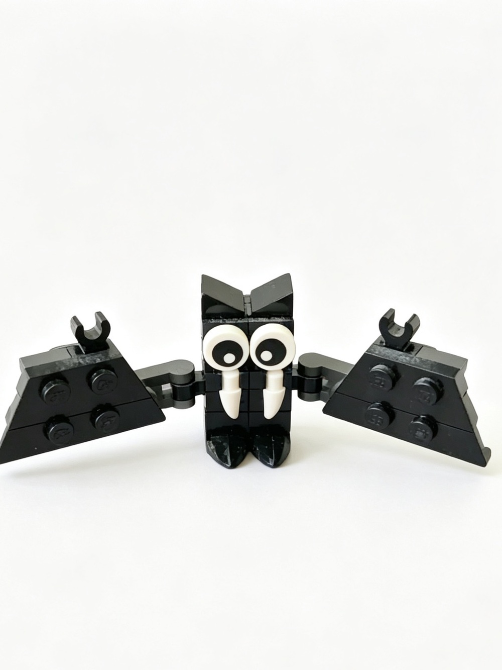Lego Black Bat Hair Accessory with White Eyes